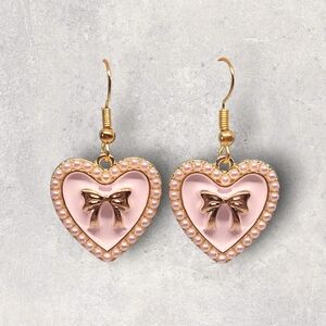 Elegant Heart-Shaped Earrings with Bow Accent